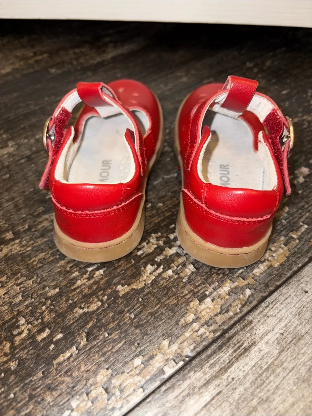 RED L'Amour leather T-strap Mary Jane feature a cutout design adjustable ankle